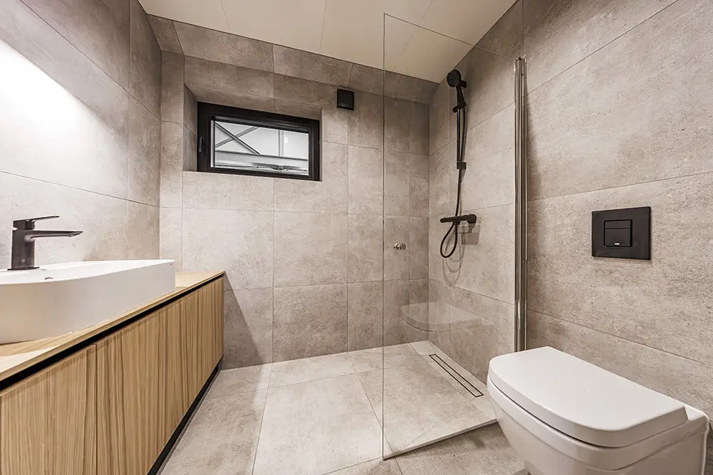 How We Waterproof a Curbless Walk-In Shower So It Doesn’t Leak in Two Years